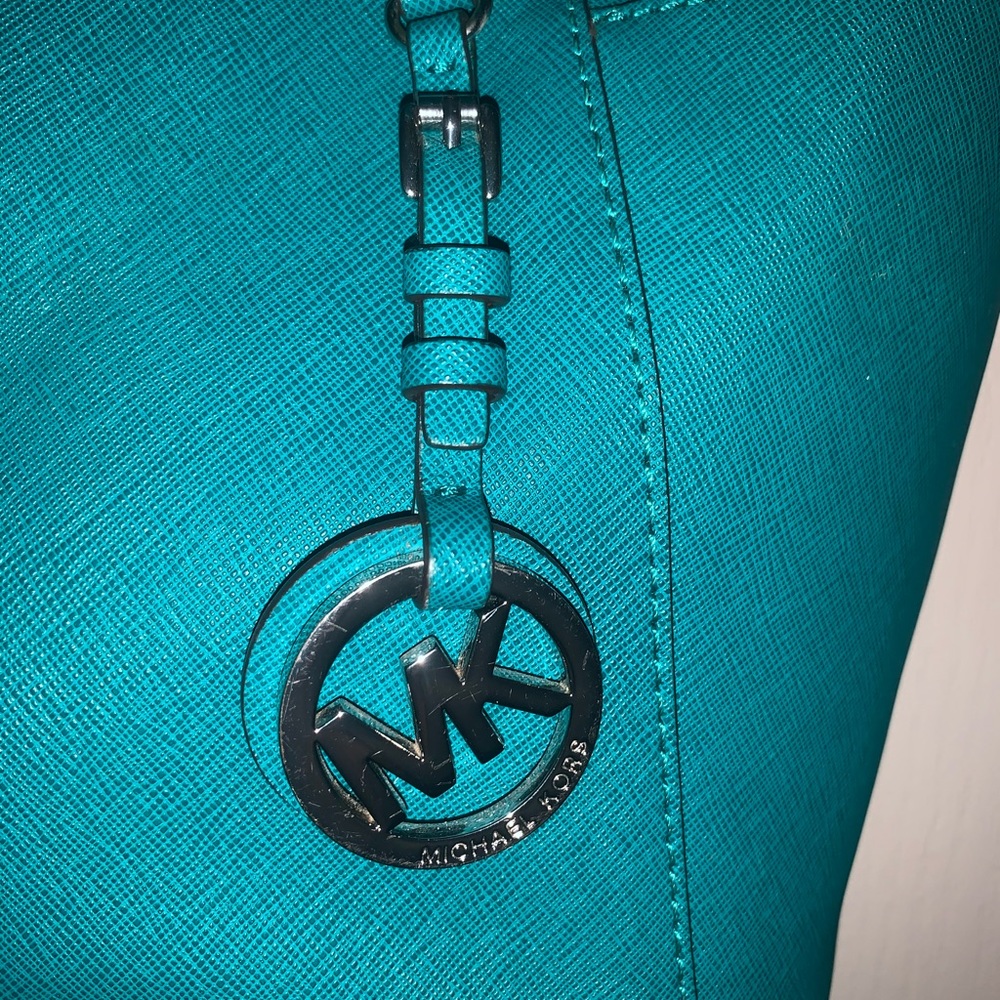 Micheal Kors purse (blue green color)